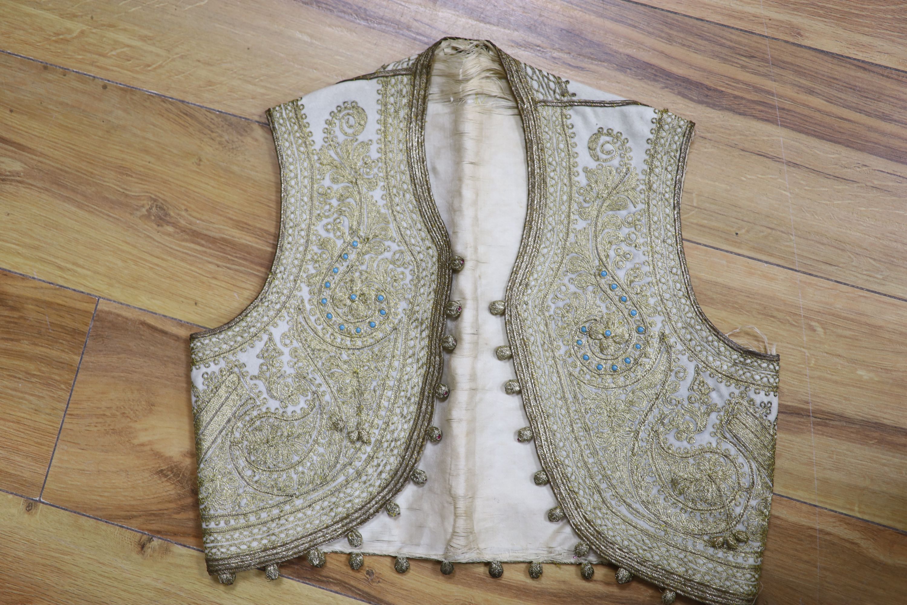 A Chinese silk robe and a waist coat